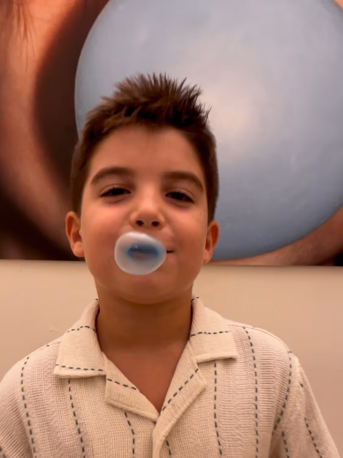 Children at the WOW bubble-gum and selfie games, Martin Parr exhibition, Lecce